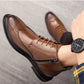 Botas brogue con punta de ala tallada y cordones para hombre